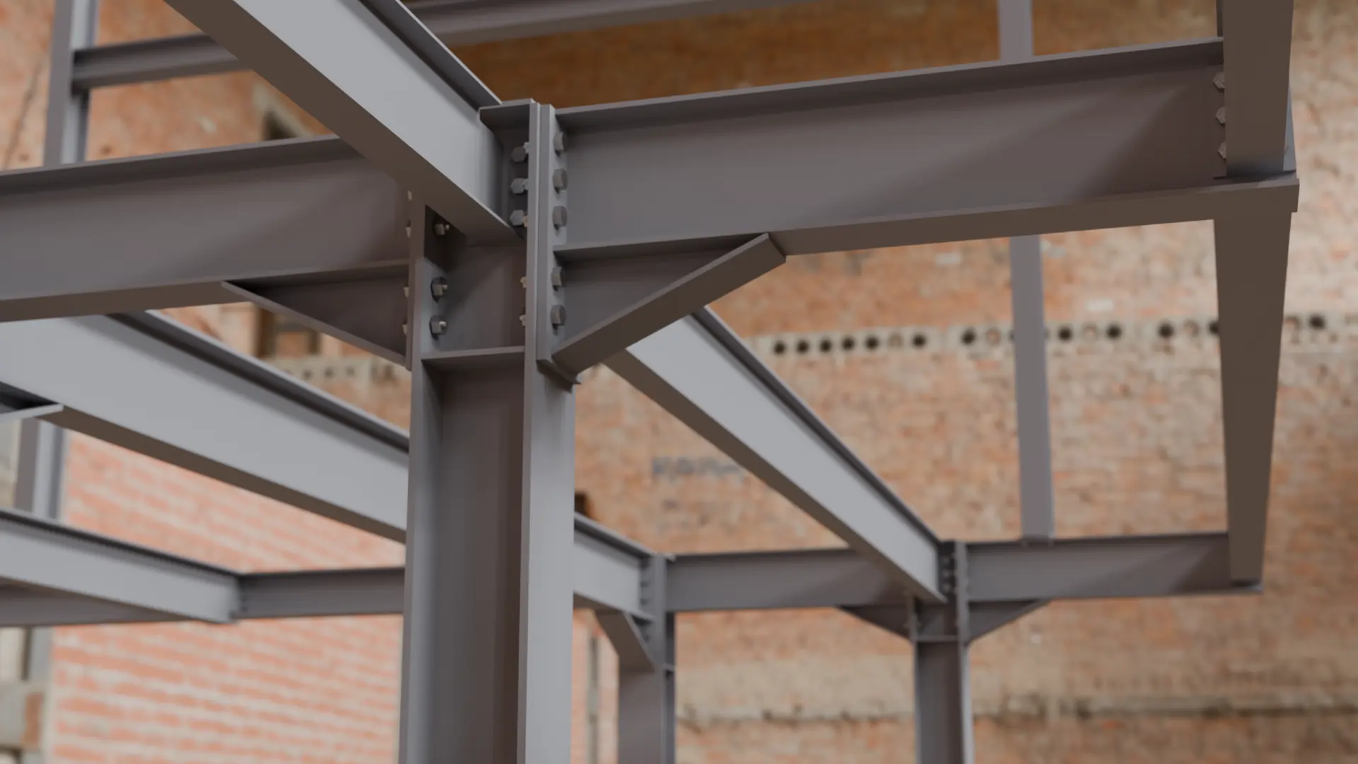 Grey beam and column steel frame inside a brick building