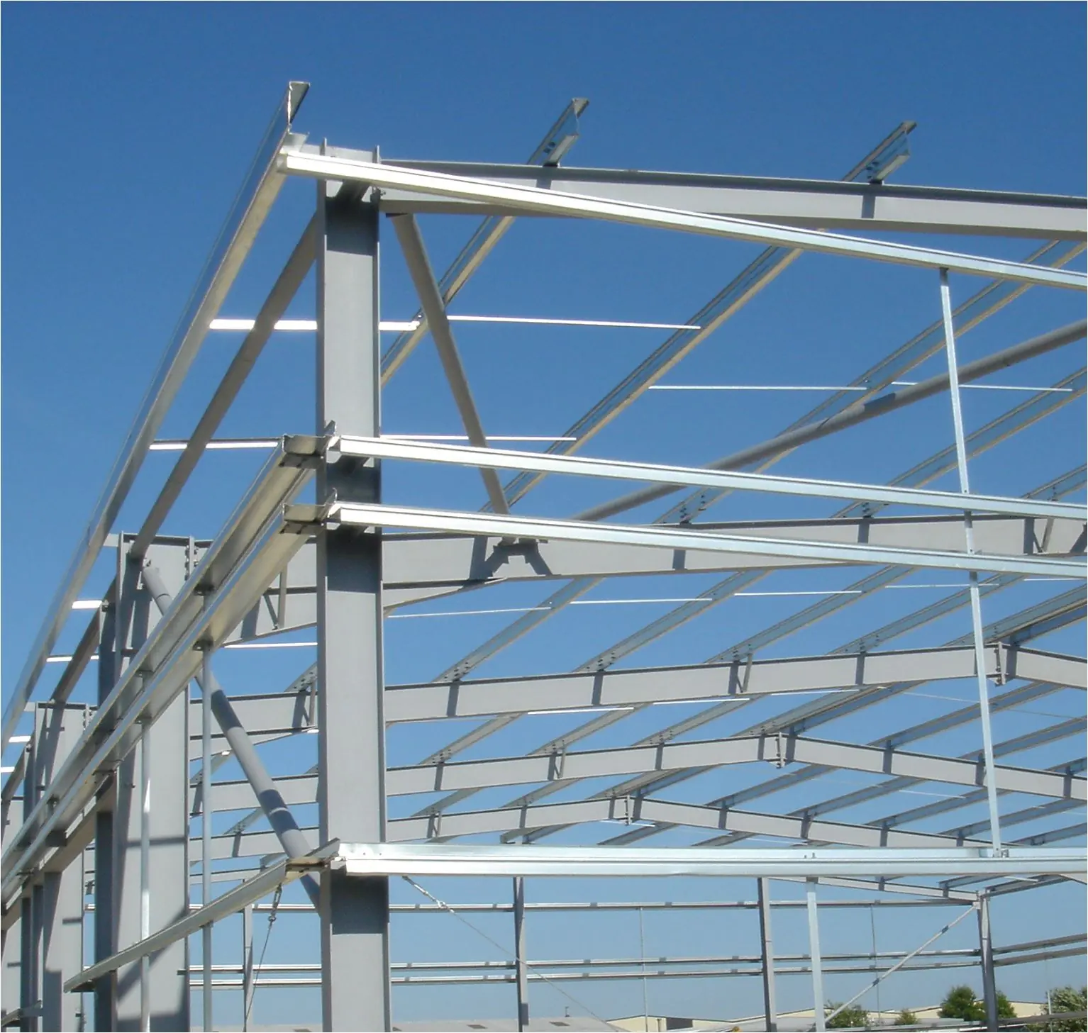 Erected steel portal frame with purlins and sheeting rails on site