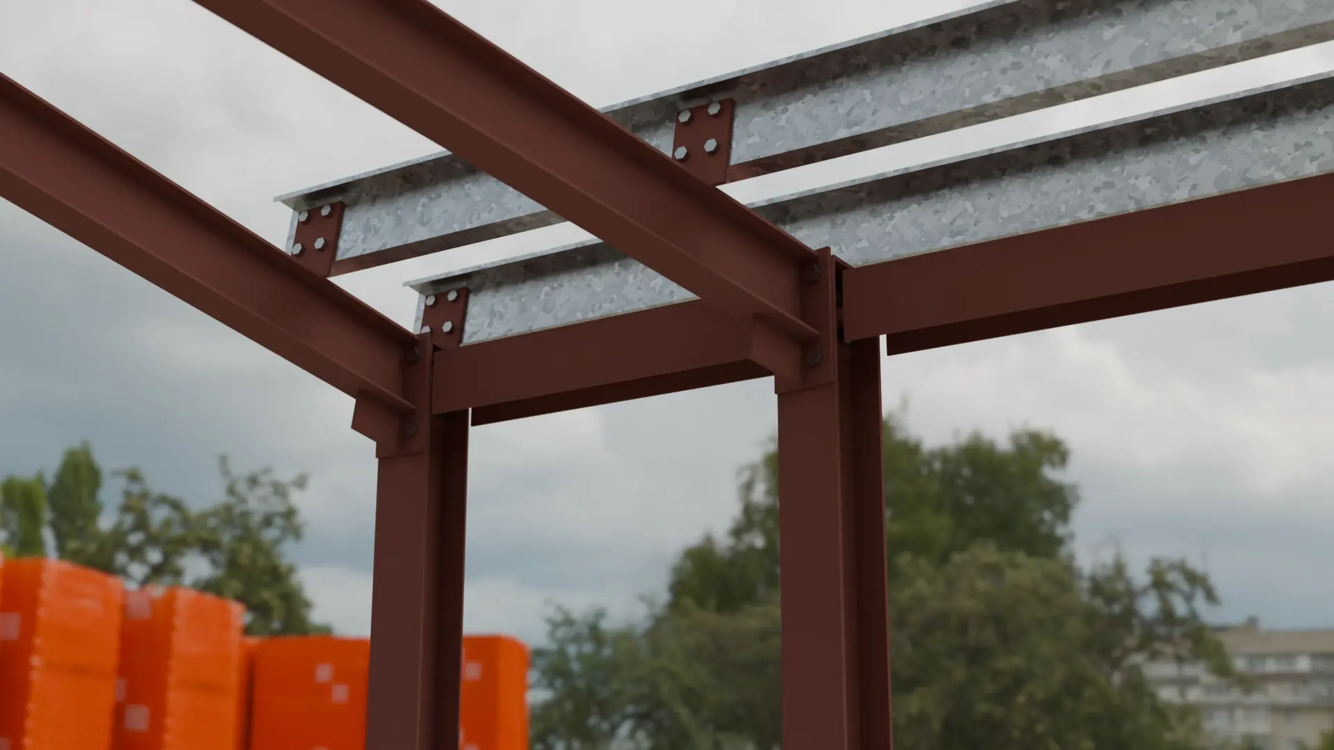 Galvanised purlins bolted to cleats on a primed steel frame